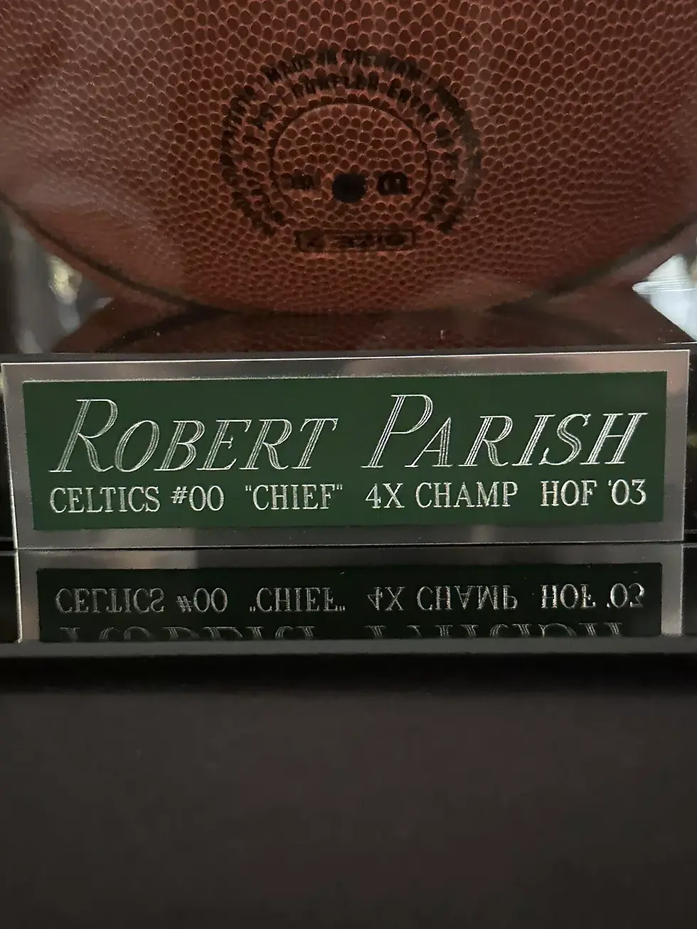 Thumbnail: Robert Parish signed Celtics logo basketball with HOF 03 inscription and display case