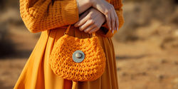 close-up-woman-wearing-knitted-bag