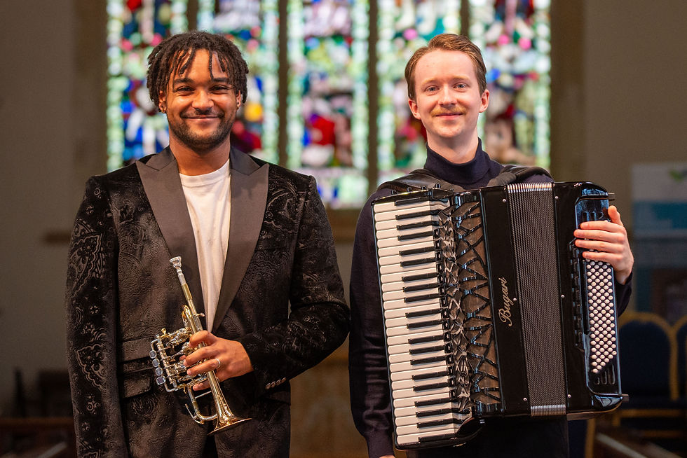Aaron Azunda Akugbo, trumpet, and Ryan Corbett, accordion