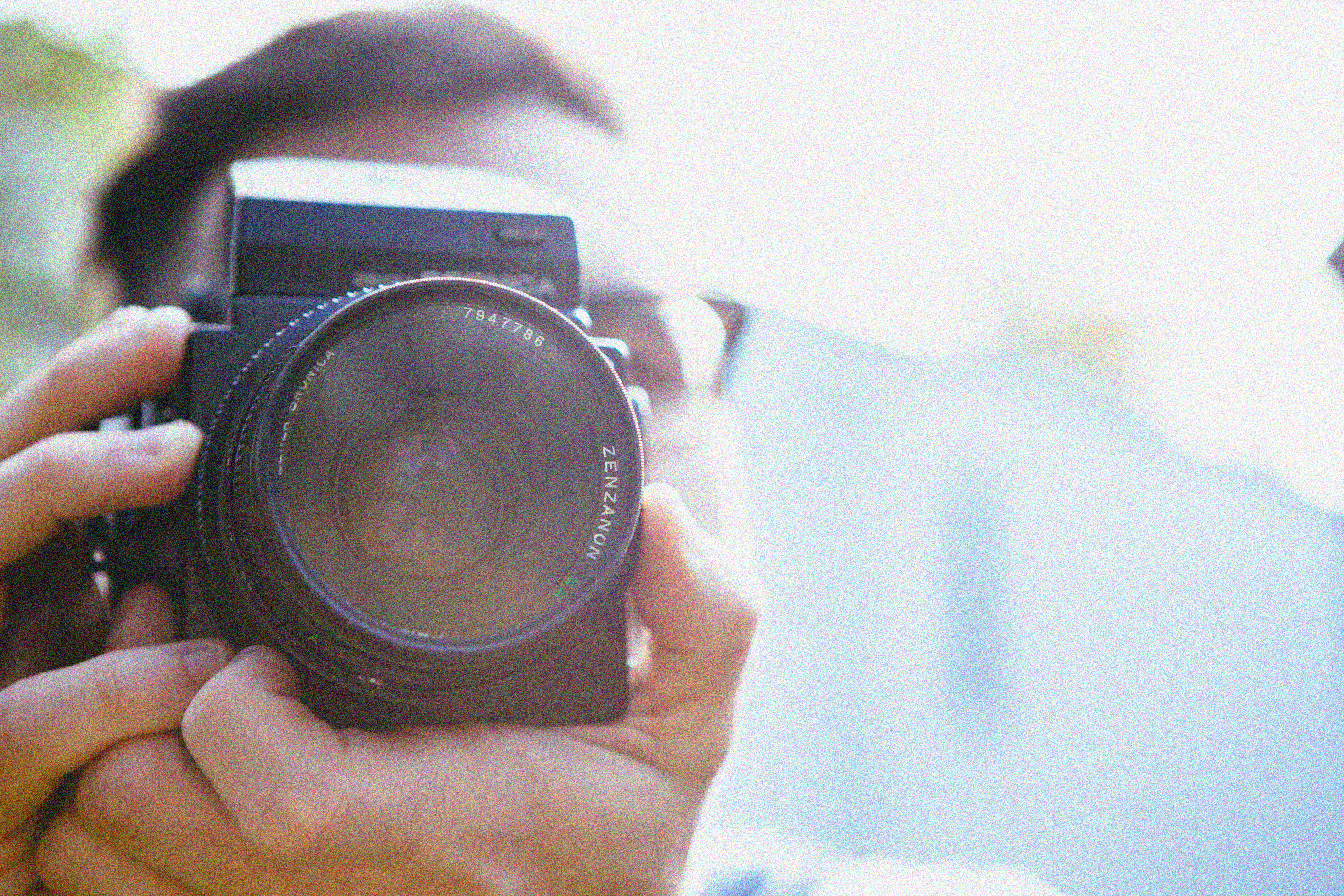 photographe, tenue, appareil photo