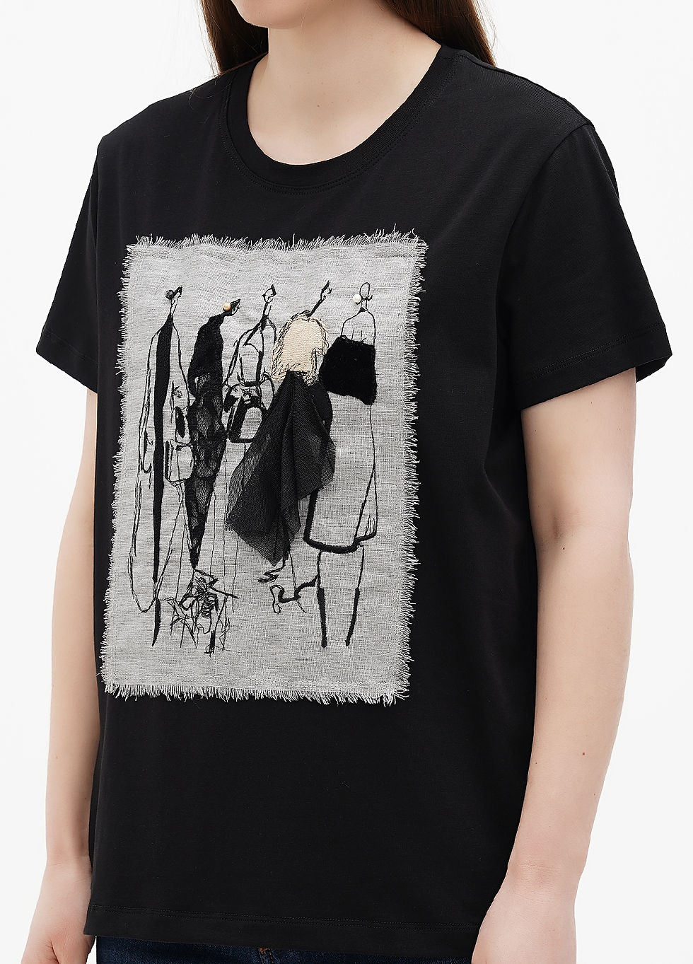 Thumbnail: Female model wearing a designer t-shirt with a vibrant graphic.