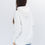 Прев'ю: Female model wearing a designer hoodie with a vibrant graphic