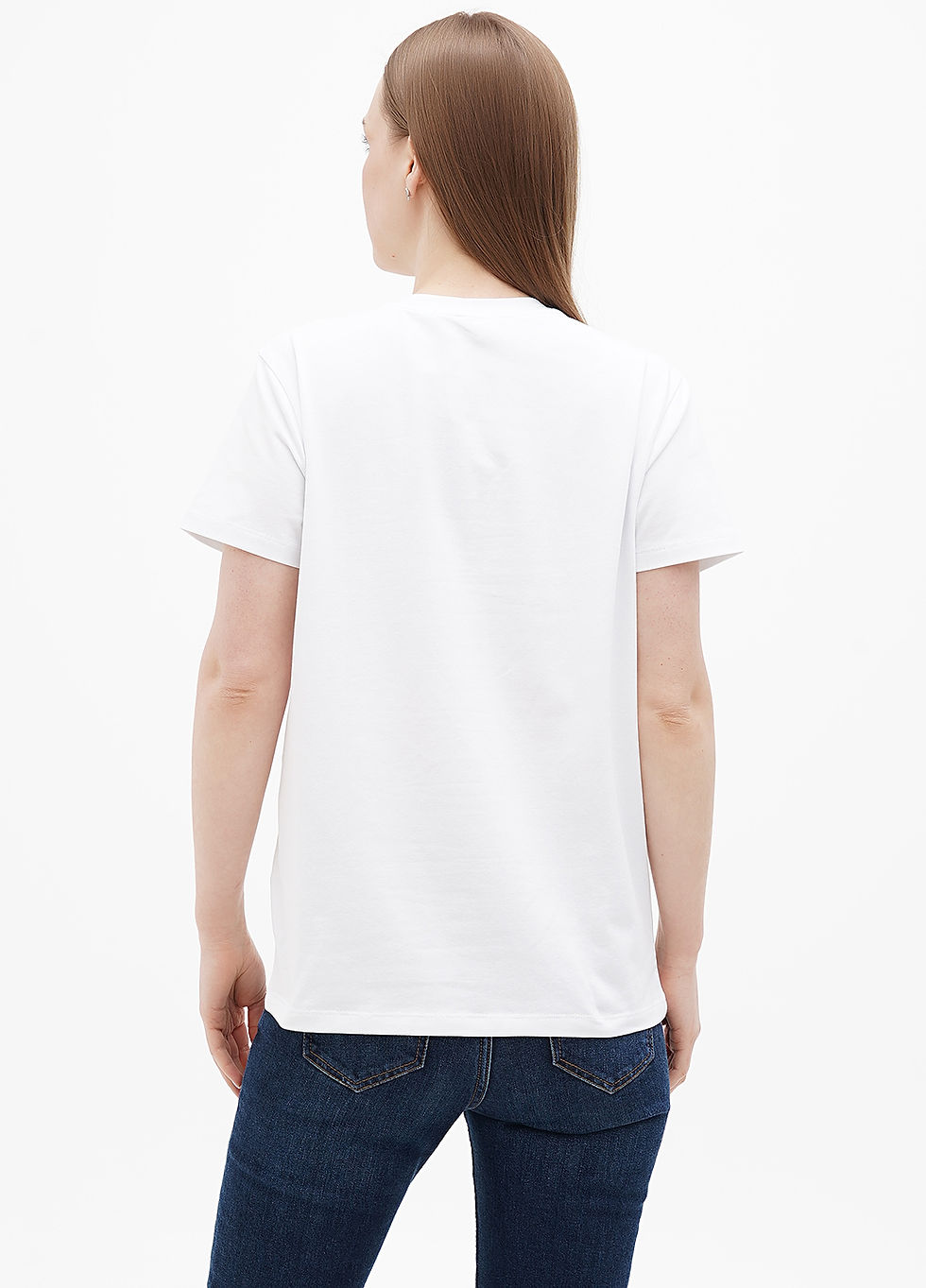 Female model wearing a designer t-shirt with a vibrant graphic.