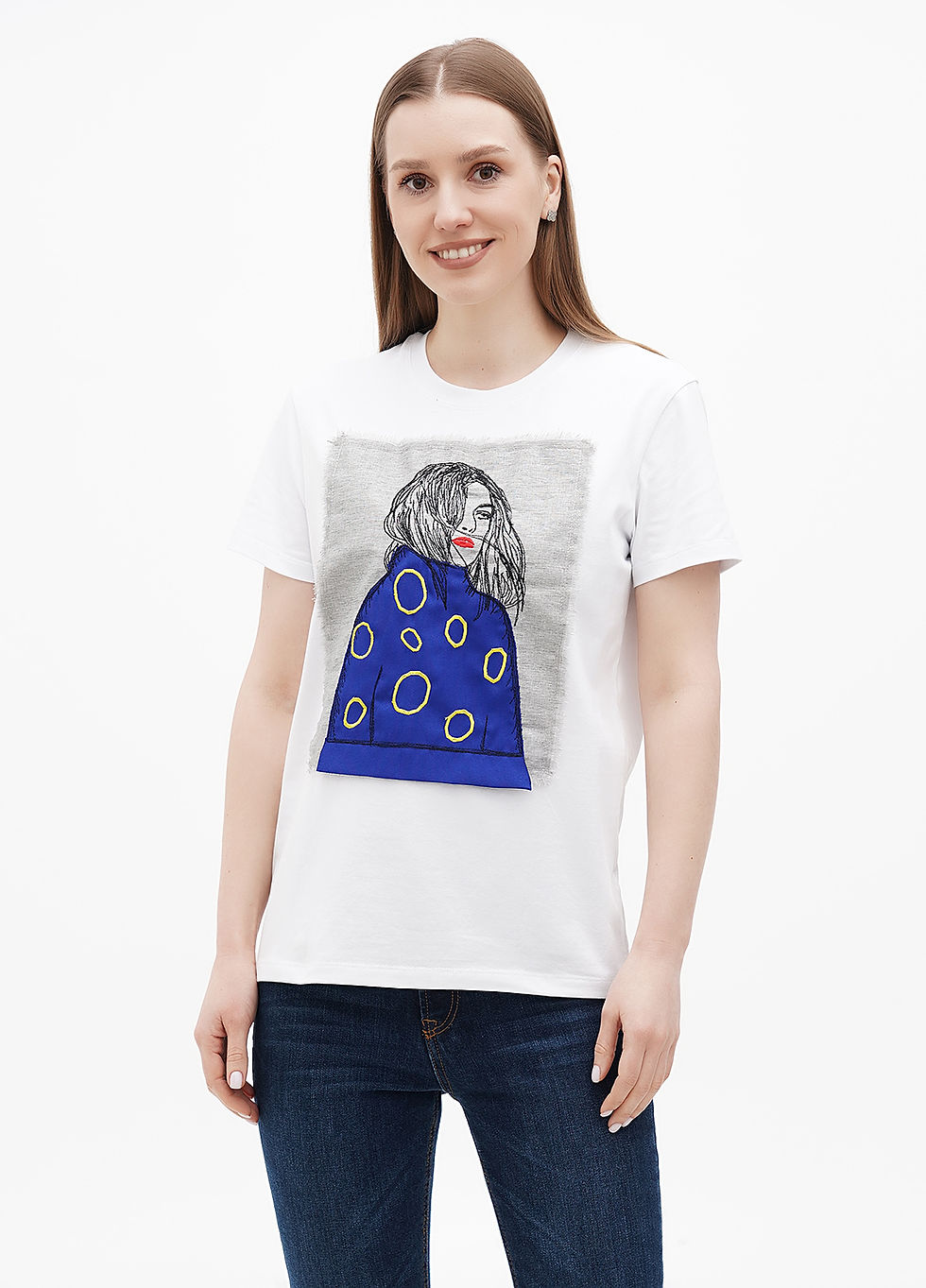 Female model wearing a designer t-shirt with a vibrant graphic