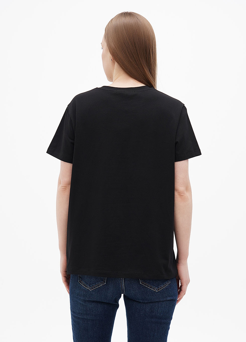 Female model wearing a designer t-shirt with a vibrant graphic