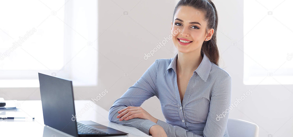 depositphotos_146084141-stock-photo-business-woman-with-laptop-in.jpg