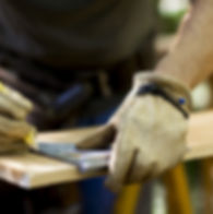 Carpenter Measuring Wood