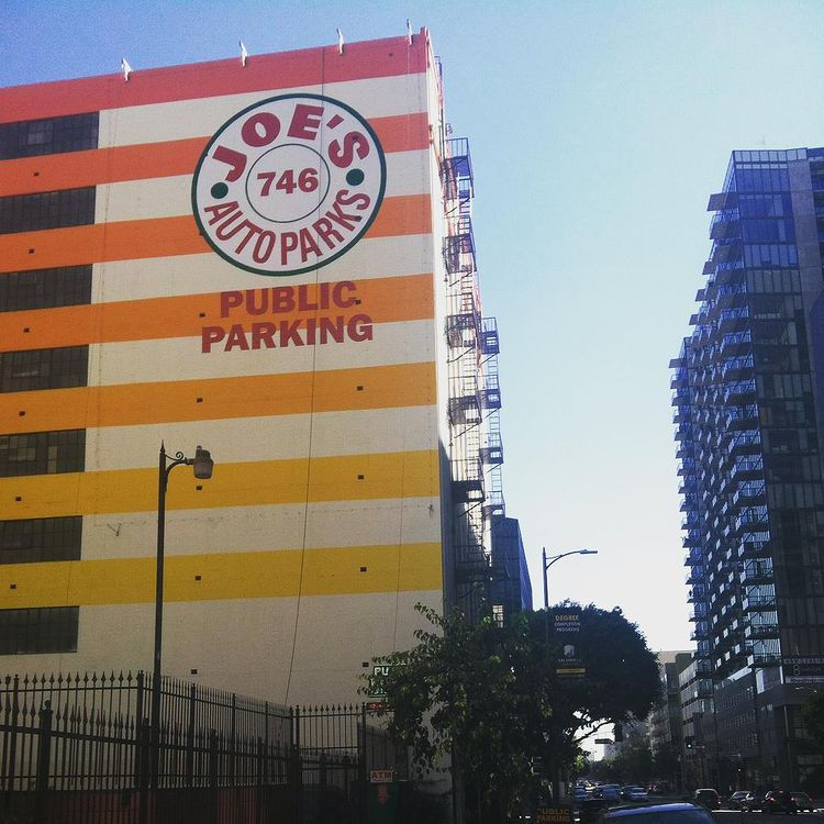 Our gigantic hand painted building sign for Joe's Auto Parks in Downtown Los Angeles, showing a public parking area. Hand painted signs can also go big for maximum visibility, giving them the size and visual profile matching any other type of sign. We serve primarily greater Los Angeles, South Bay, Long Beach, Orange County and will travel to most areas in Southern California.