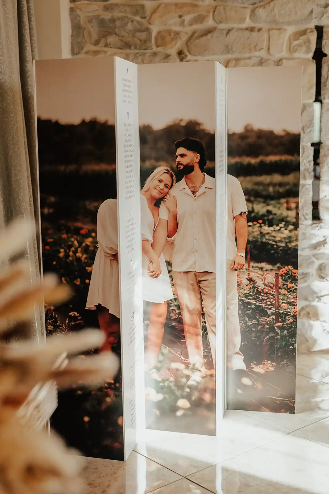 Curated photo seating chart display for a luxury estate wedding at The Barn at Silverstone in Lancaster, PA.