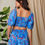 Thumbnail: Davi & Dani Smocing Bodice Puff Short Sleeve Printed Crop Top