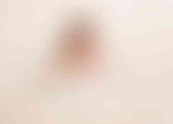 Little girl kissing her newborn baby brother by Christchurch Newborn Photographer Kirsten Naomi Photography