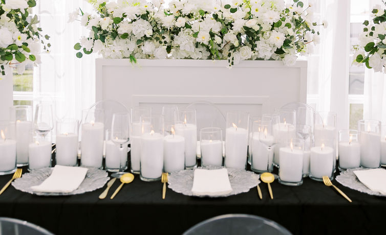 Modern white and greenery wedding floral arrangement from the Eliana Floral Collection.