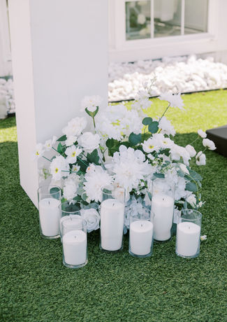 Luxury sand candles on wedding reception dessert table