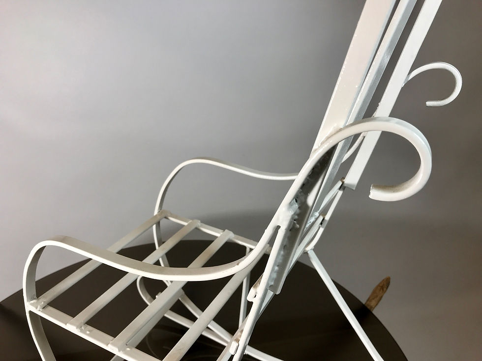 Thumbnail: Child's Wrought Iron Rocking Chair.
