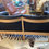 Thumbnail: SOLD - Unsual Mid Century Danish 2 Seater Black Leather With Beach Frame