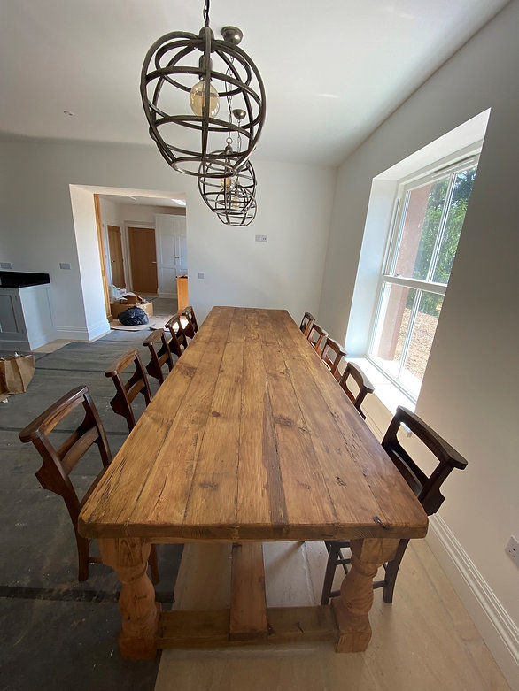 Thumbnail: 11ft handmade reclaimed pine refectory table with a thick table top with vintage chairs either side