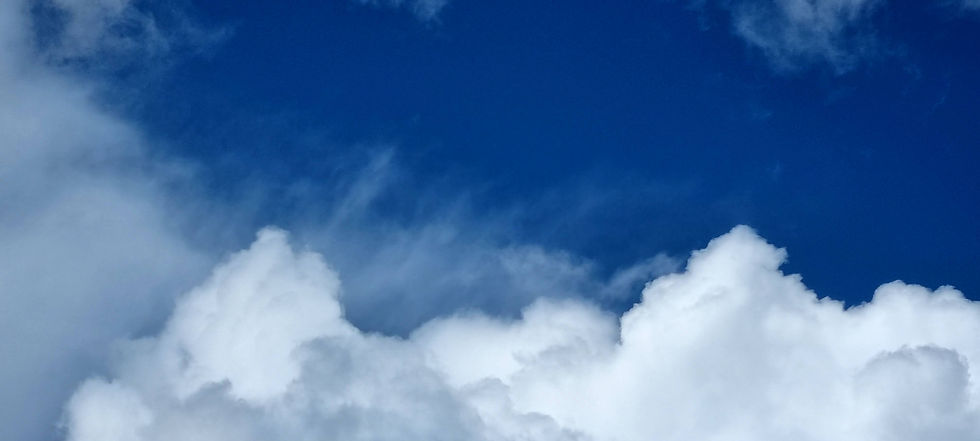 headerblueskywhiteclouds.heic