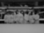 factory workers wearing PPE in a cutting room