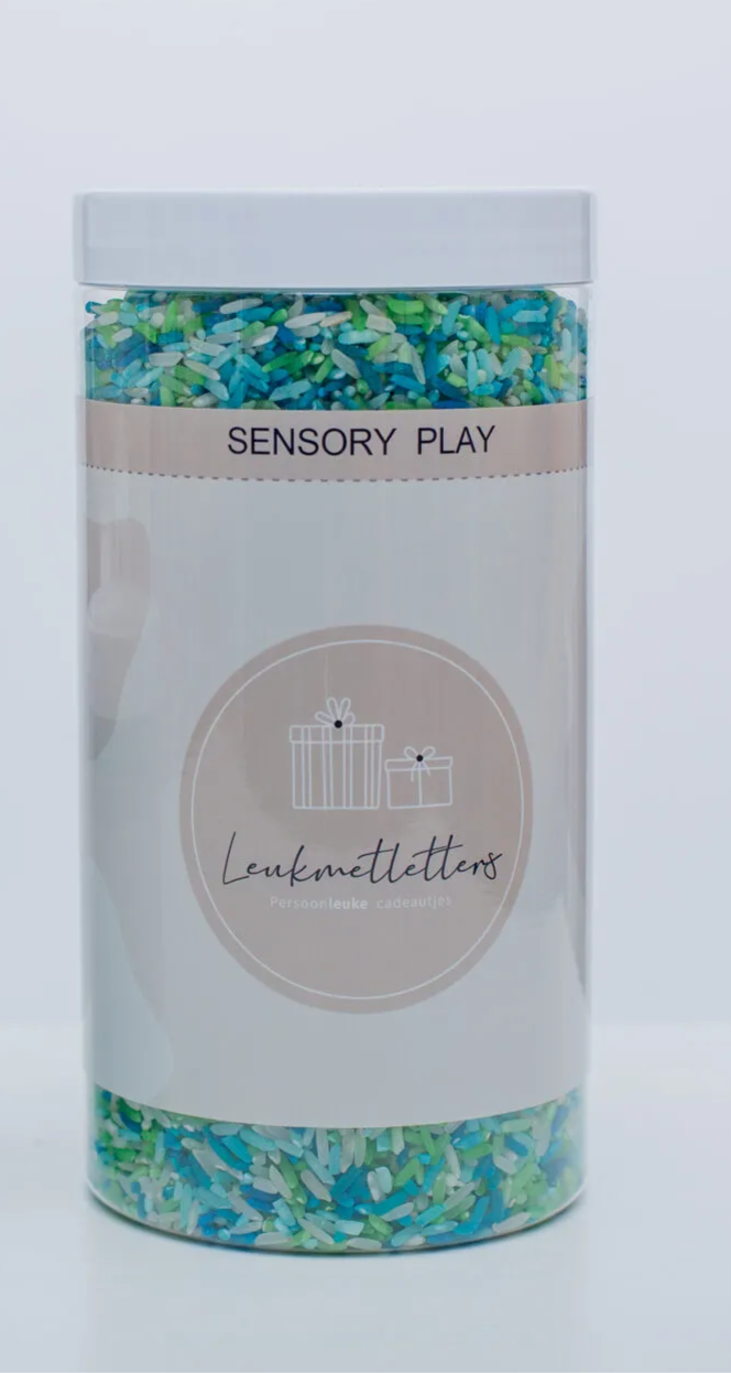 Sensorik Füllform Dino-Abenteuer mit farbigem Spielreis im Sensorik Tablett