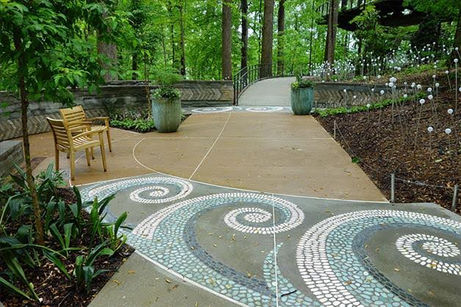 An award-winning LithoMosaic installation, seamlessly blending artistry and landscape design in the heart of Storza Woods.