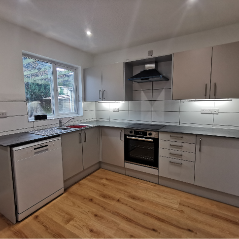 Traditional style kitchen installation with wooden cabinets in Oxfordshire