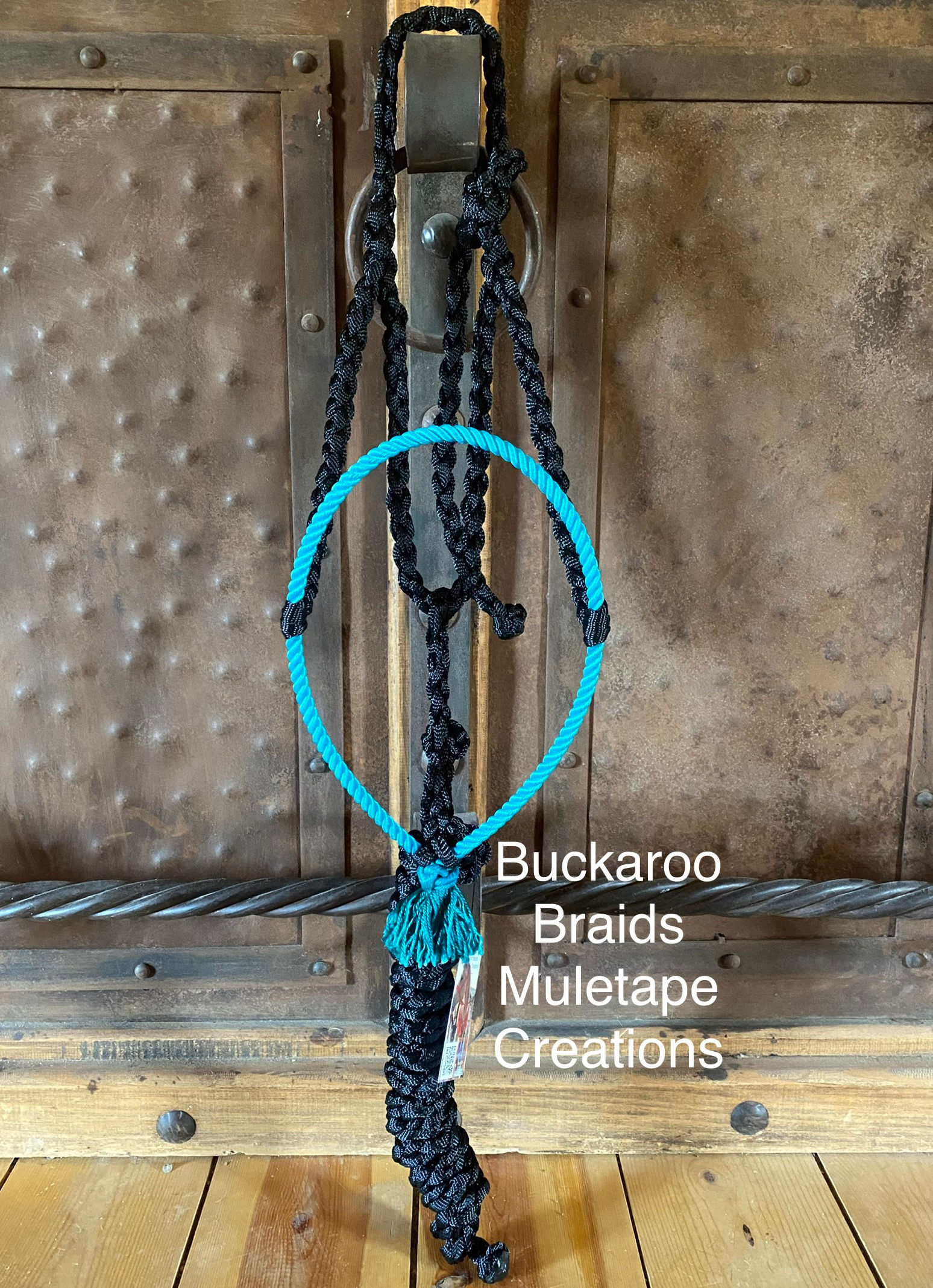 Turquoise rope nose halter with black Muletape 