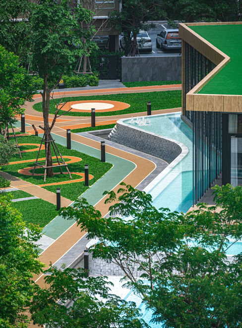 Swimming pool, water feature, and activity courtyard at Plum Alive 1.