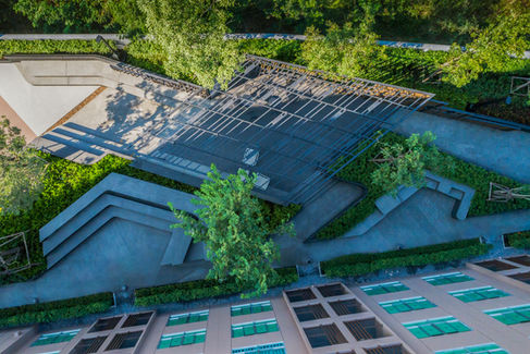 Aerial view showing pathways, seating areas, and pavilion at dcondo Campus Kamphaeng Saen.