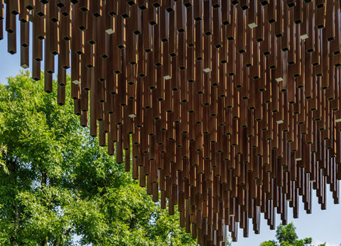 sculptural pavilion with canopy trees at Baan Issara Bangna