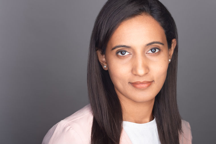 Headshot photography for women on Grey Background