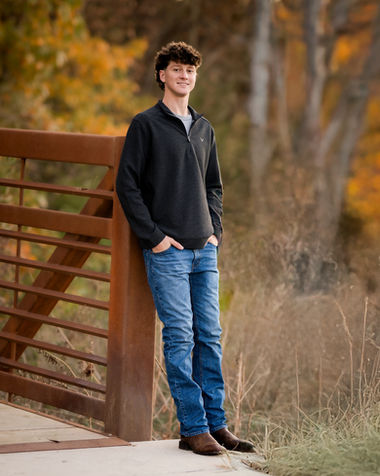Senior guys outdoor portrait ideas Overland Park on bridge