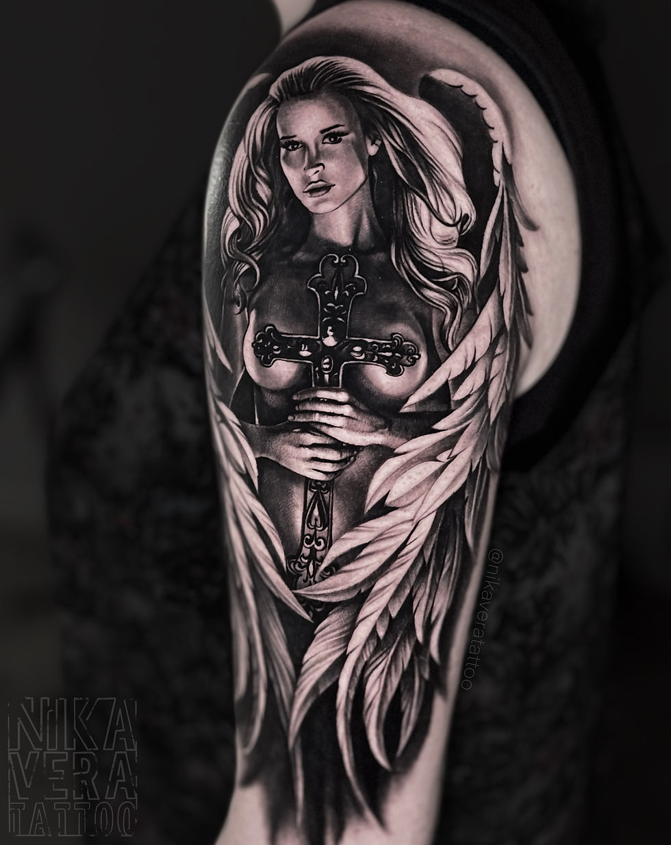 fallen angel tattoo on shoulder
