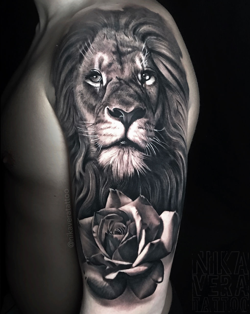 lion and rose tattoo on shoulder