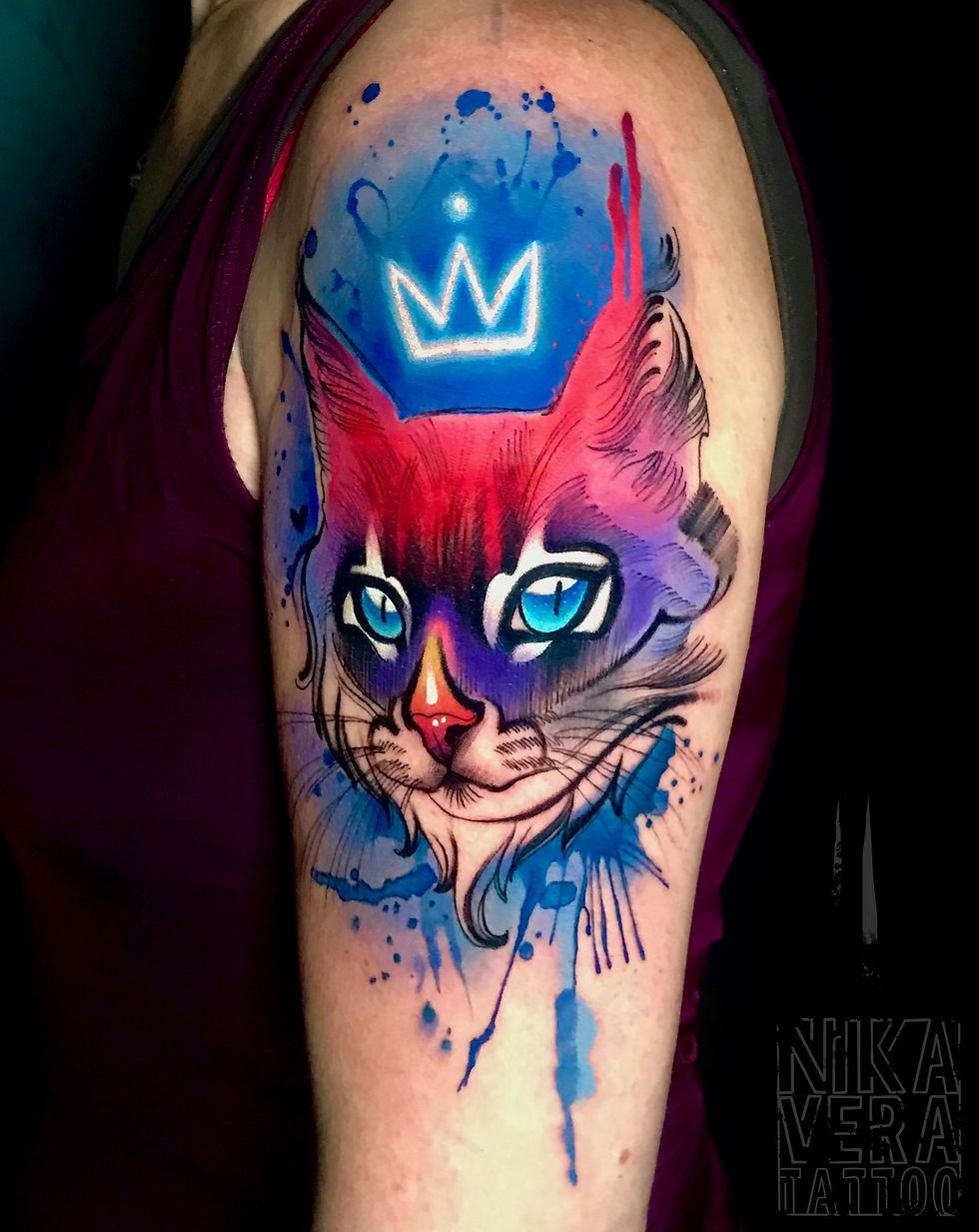 watercolor cat tattoo on shoulder