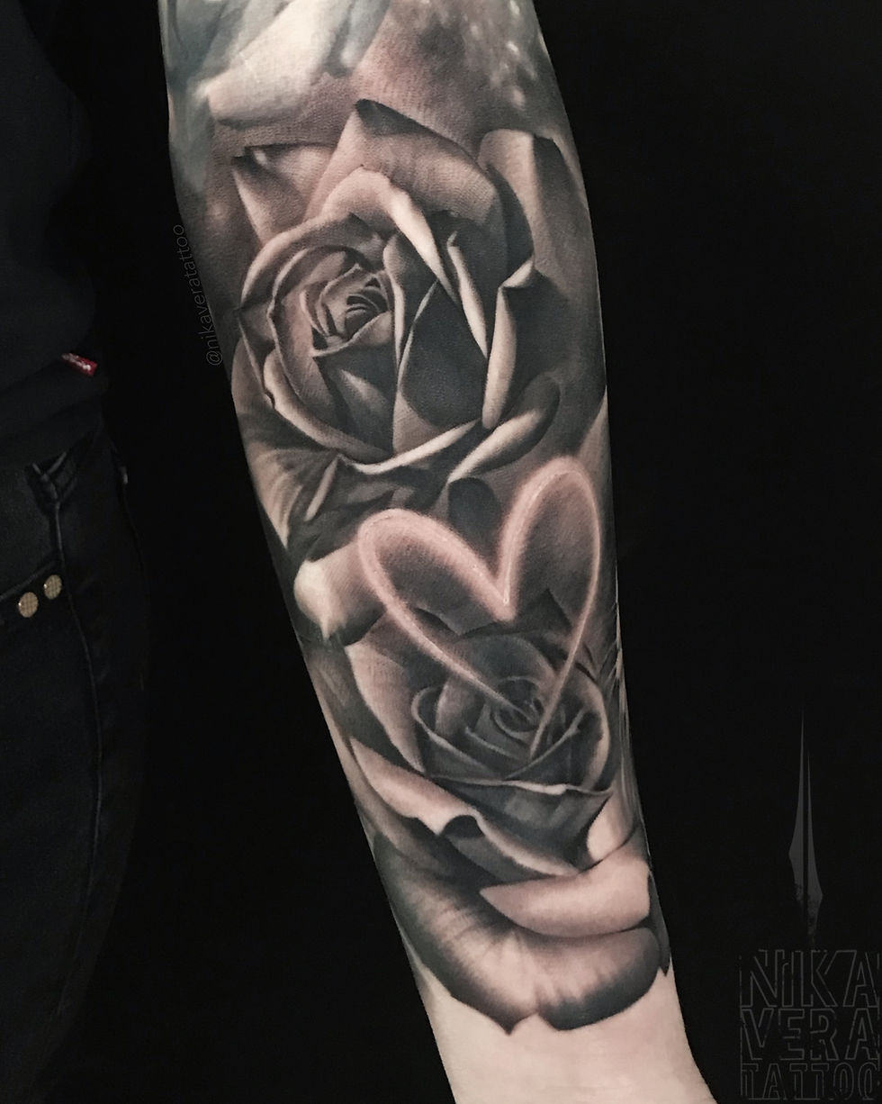 roses with heart on forearm