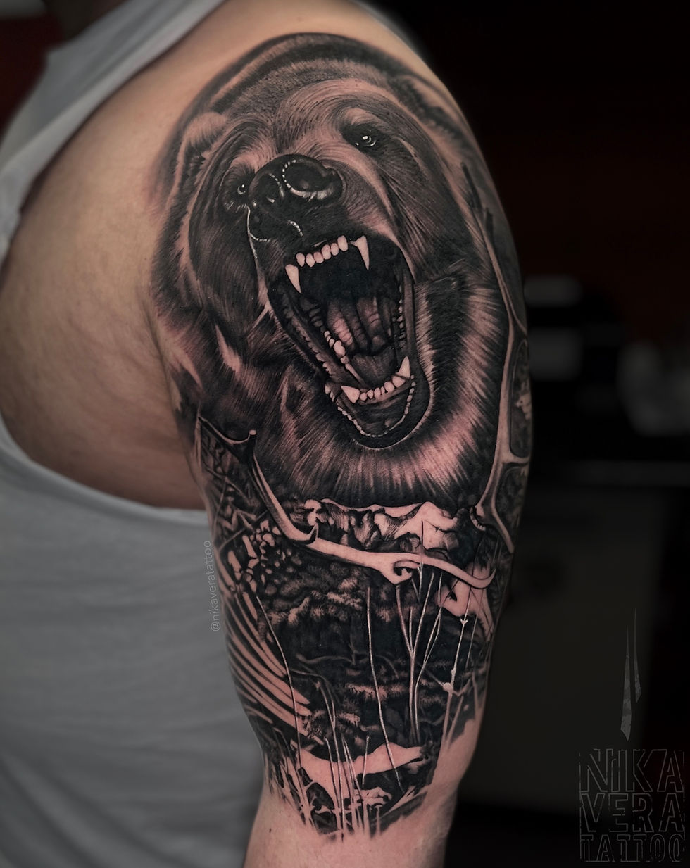 bear with dear remains on shoulder