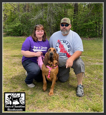 Breeders Brenda and Chris Crain with Buttercup.
