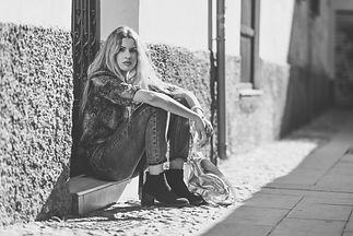 woman-sitting-step-door.jpg