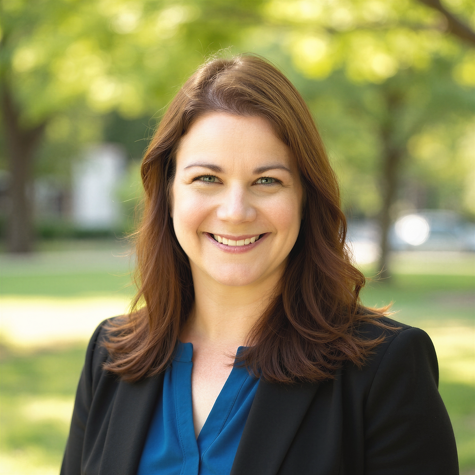 Headshot of Amanda Downie, MBA, Coach, Consultant in a blue blouse and blazer.