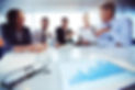 digital-tablet-glasses-with-executives-background_edited.jpg
