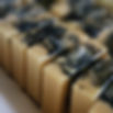 row of activated charcoal bar soap