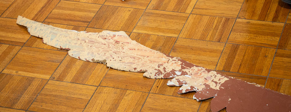 A piece of the original painting recovered during our 2024 renovations.