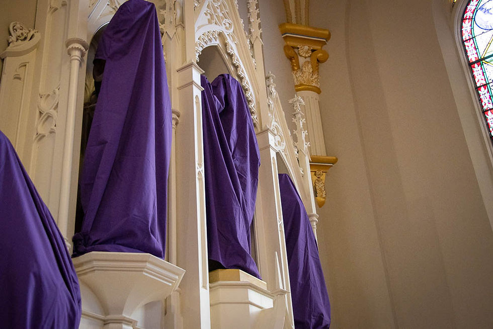 Statues over the side altar at St. Mary are veiled until Easter.