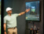 Coach Adam Kolloff uses Trackman technology to analyze a golfer's swing during a lesson. (Photo courtesy of Pure Drive Golf)