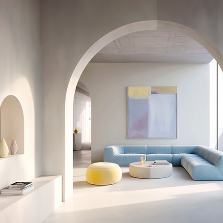 Modern interior with archway, blue sectional sofa, yellow pouf, abstract painting, and minimal decor. Light, calming atmosphere.