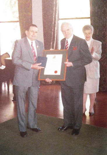 Jack Butler receiving Anzac award with G