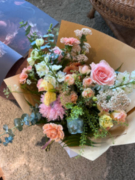 Photo is an example of soft pastel in wrapped bouquet.