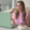 Anne Keen speaking to someone on the computer during a Telehealth therapy session.