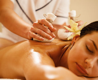 closeup-relaxed-woman-getting-back-massage-with-herbal-balls-health-spa.jpg