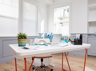 Custom Excel spreadsheet open on a remote bookkeeper’s laptop.